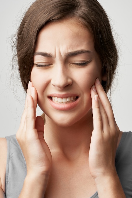 woman with jaw pain